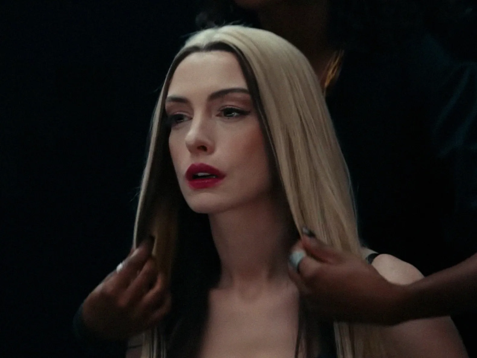 Image may contain Anne Hathaway Blonde Hair Person Adult Head Face Baby Cosmetics and Lipstick
