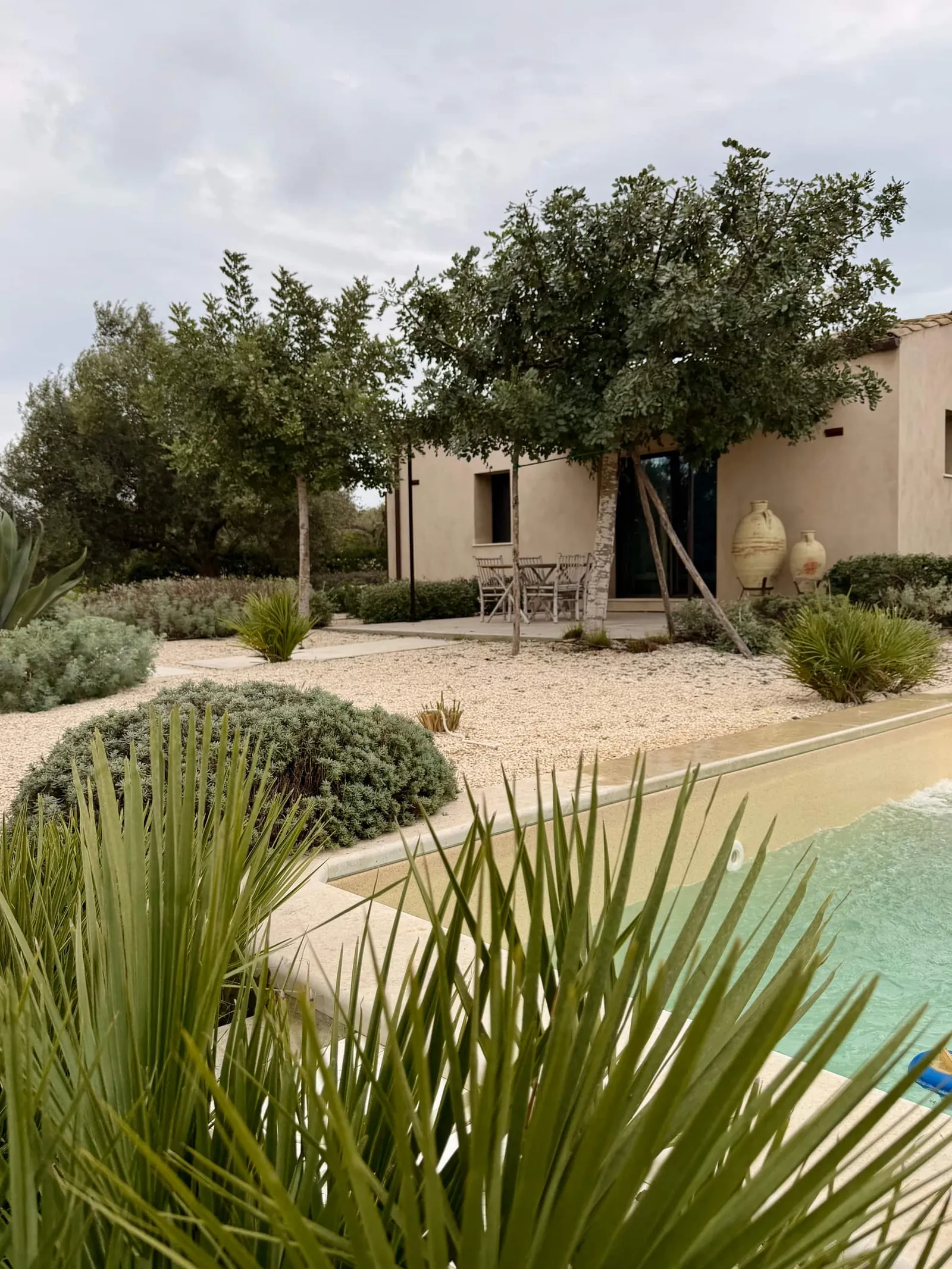 Image may contain Architecture Building House Housing Villa Pool Water Outdoors Swimming Pool and Hacienda