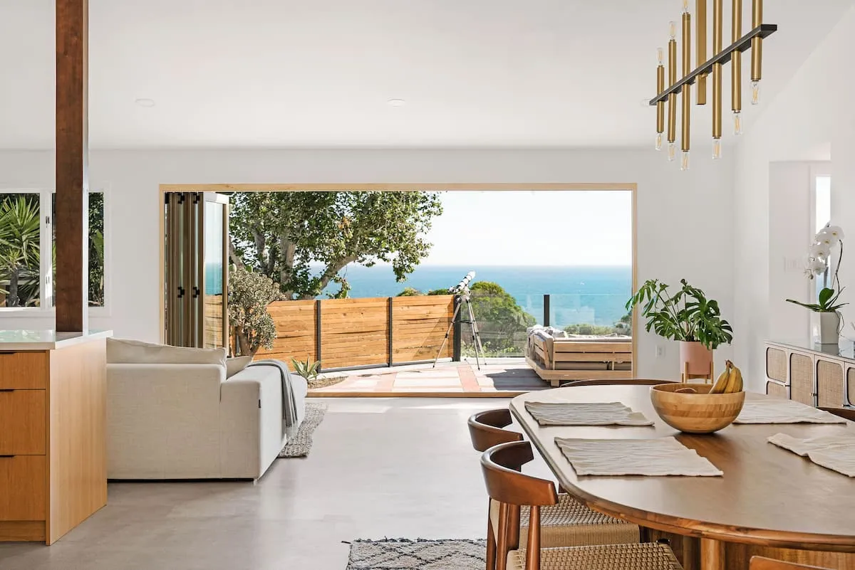 Image may contain Indoors Interior Design Architecture Balcony Building Wood Chair and Furniture