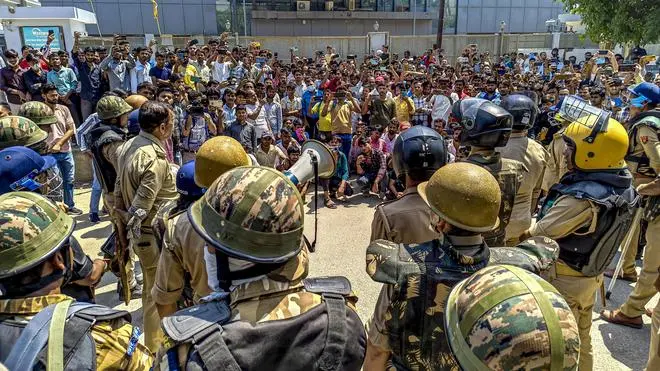 At a workers’ protest against low wages and poor working conditions, in Noida, Uttar Pradesh, on April 13, 2026. At a workers’ protest against low wages and poor working conditions, in Noida, Uttar Pradesh, on April 13, 2026.