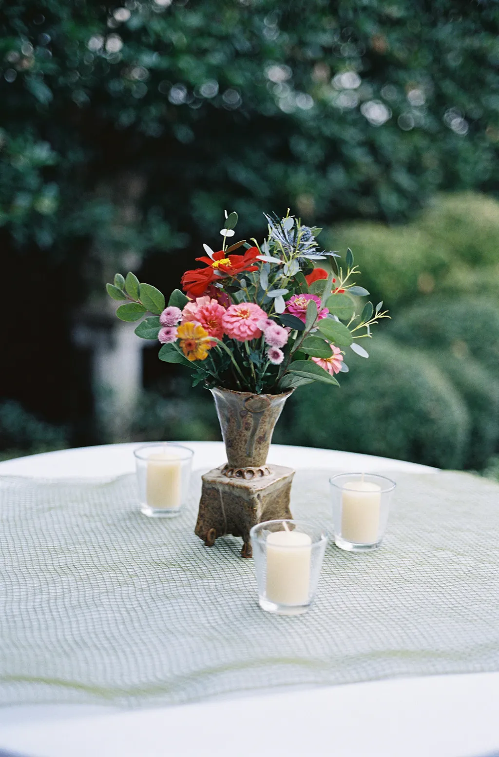 Image may contain Flower Flower Arrangement Plant Flower Bouquet Furniture Table Tabletop Potted Plant and Cup