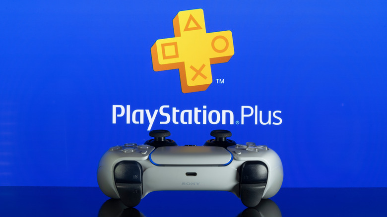 The PlayStation Plus logo with a DualSense controller in the foreground