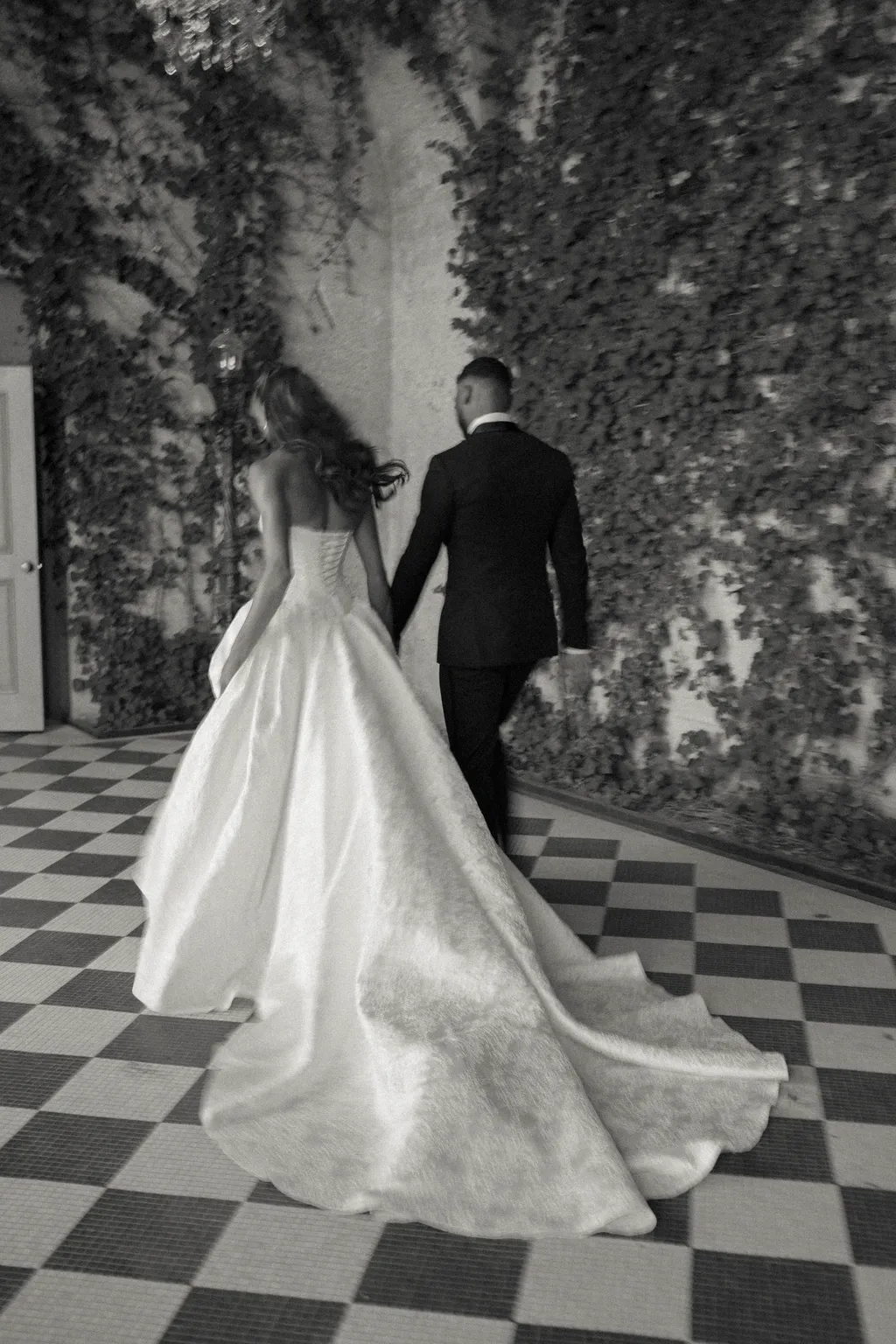 Image may contain Clothing Dress Formal Wear Fashion Gown Suit Wedding Wedding Gown Adult Person Face and Head