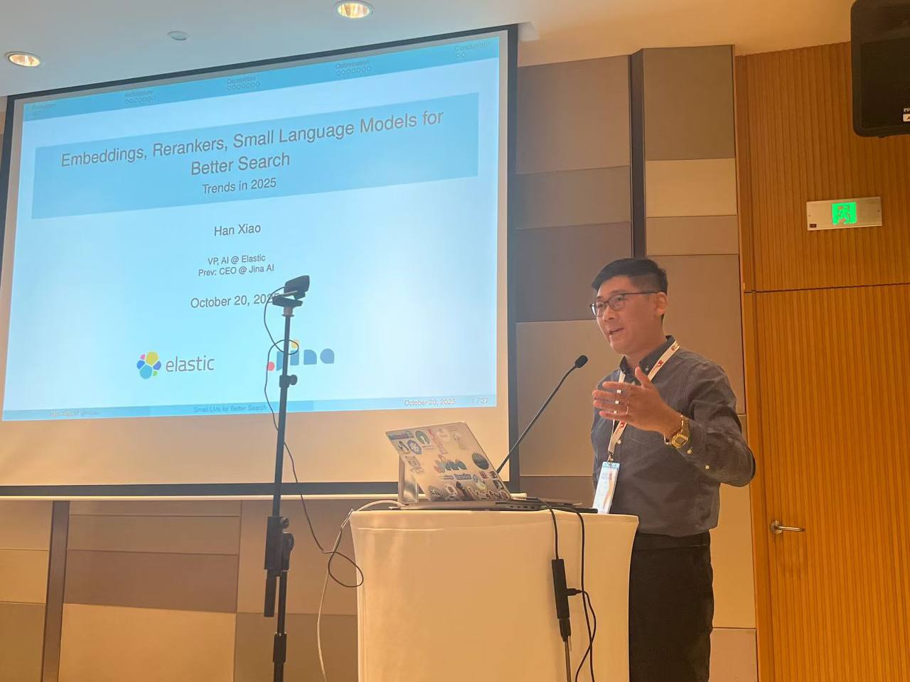 Han Xiao presenting at EMNLP 2025 BoF session
