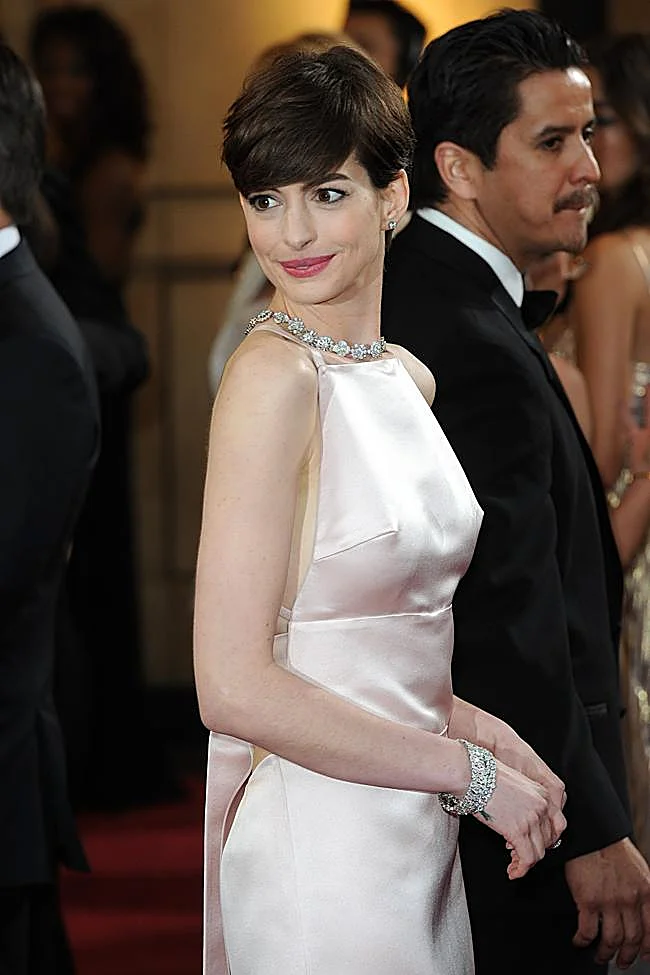 Anne Hathaway, de Prada.