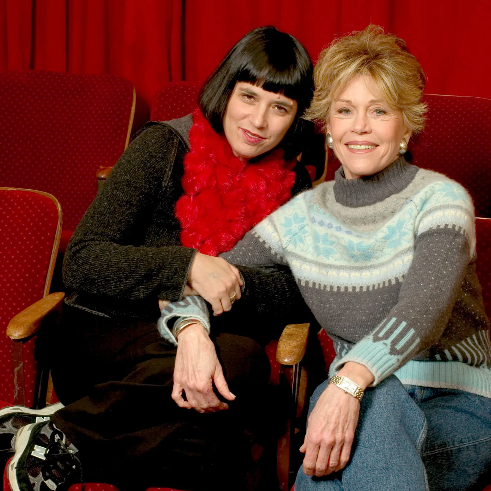 Image may contain Jane Fonda Eve Ensler Couch Furniture Clothing Pants People Person Face Head and Photography
