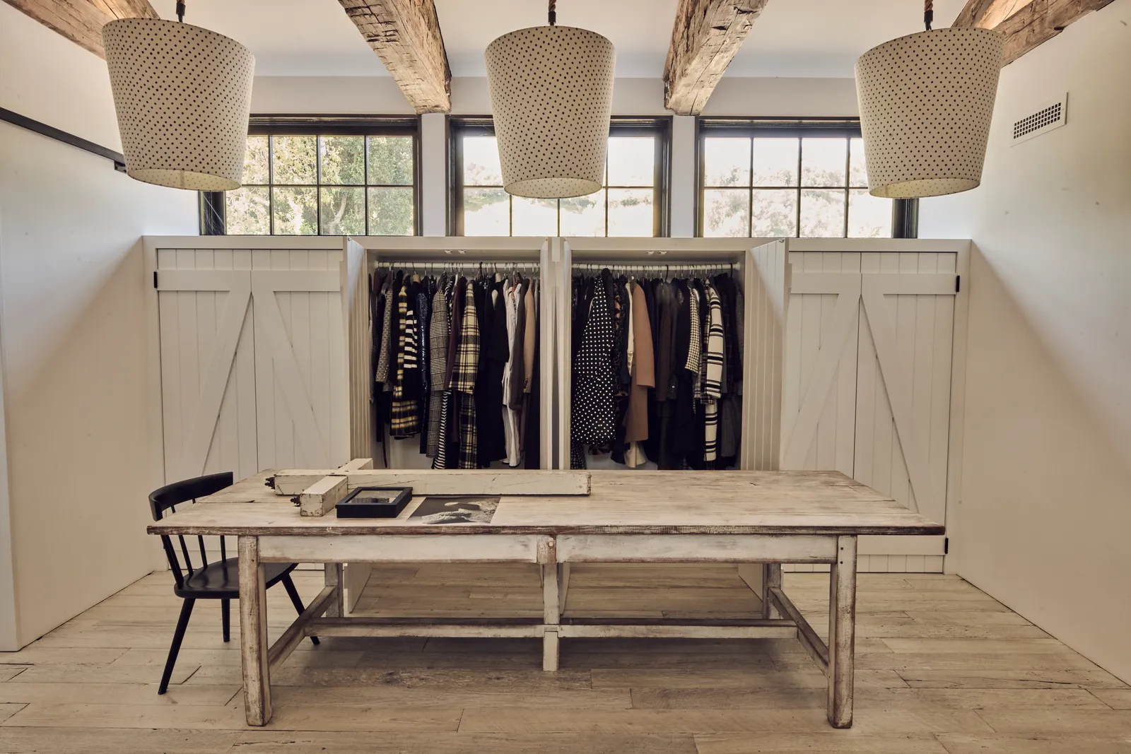 Image may contain Dressing Room Indoors Room Furniture Lamp and Closet