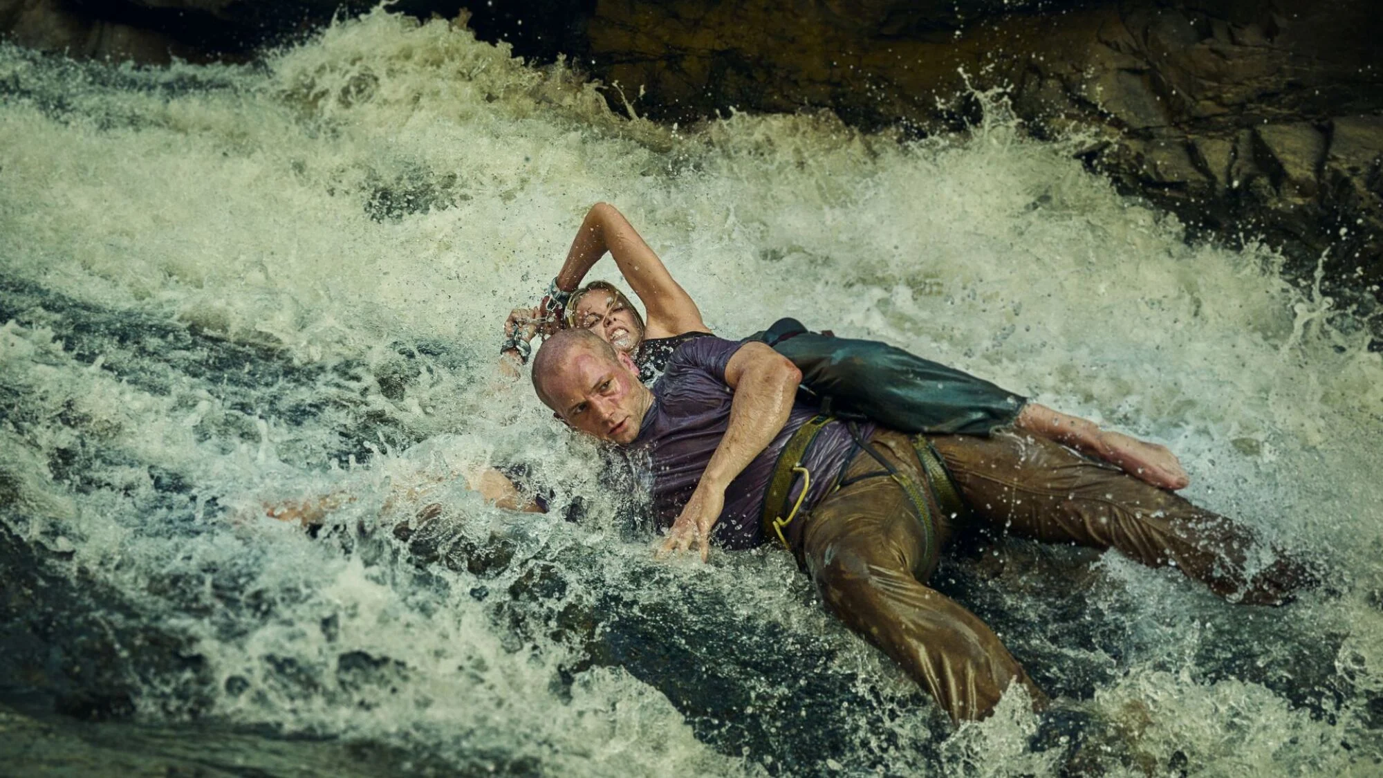 Taron Egerton and Charlize Theron in "Apex."