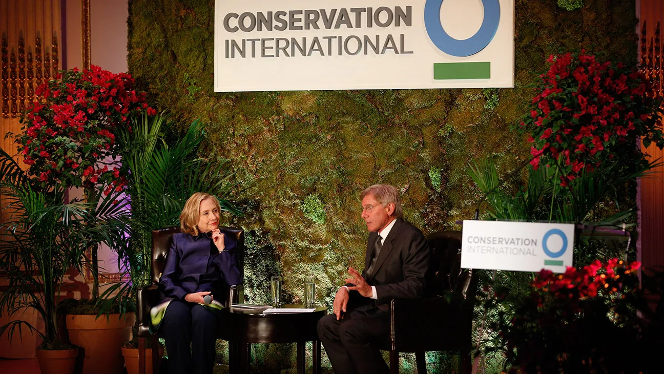 (L-R) Former U.S. Secretary of State Hillary Rodham Clinton and Harrison Ford attend the Conservation International 16th annual New York dinner at The Plaza Hotel on May 15, 2013 in New York City.