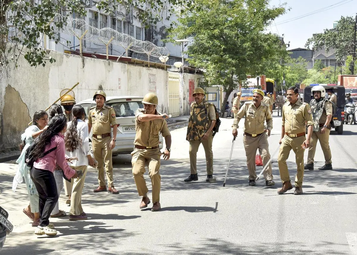A confrontation between protesters and police personnel in Noida on April 13.