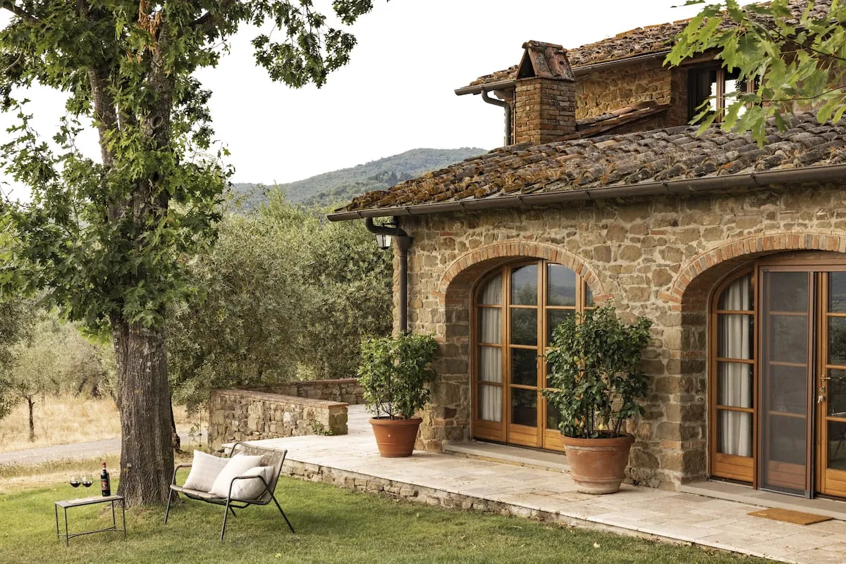 Image may contain Door Architecture Building Housing Plant Chair Furniture House and Villa