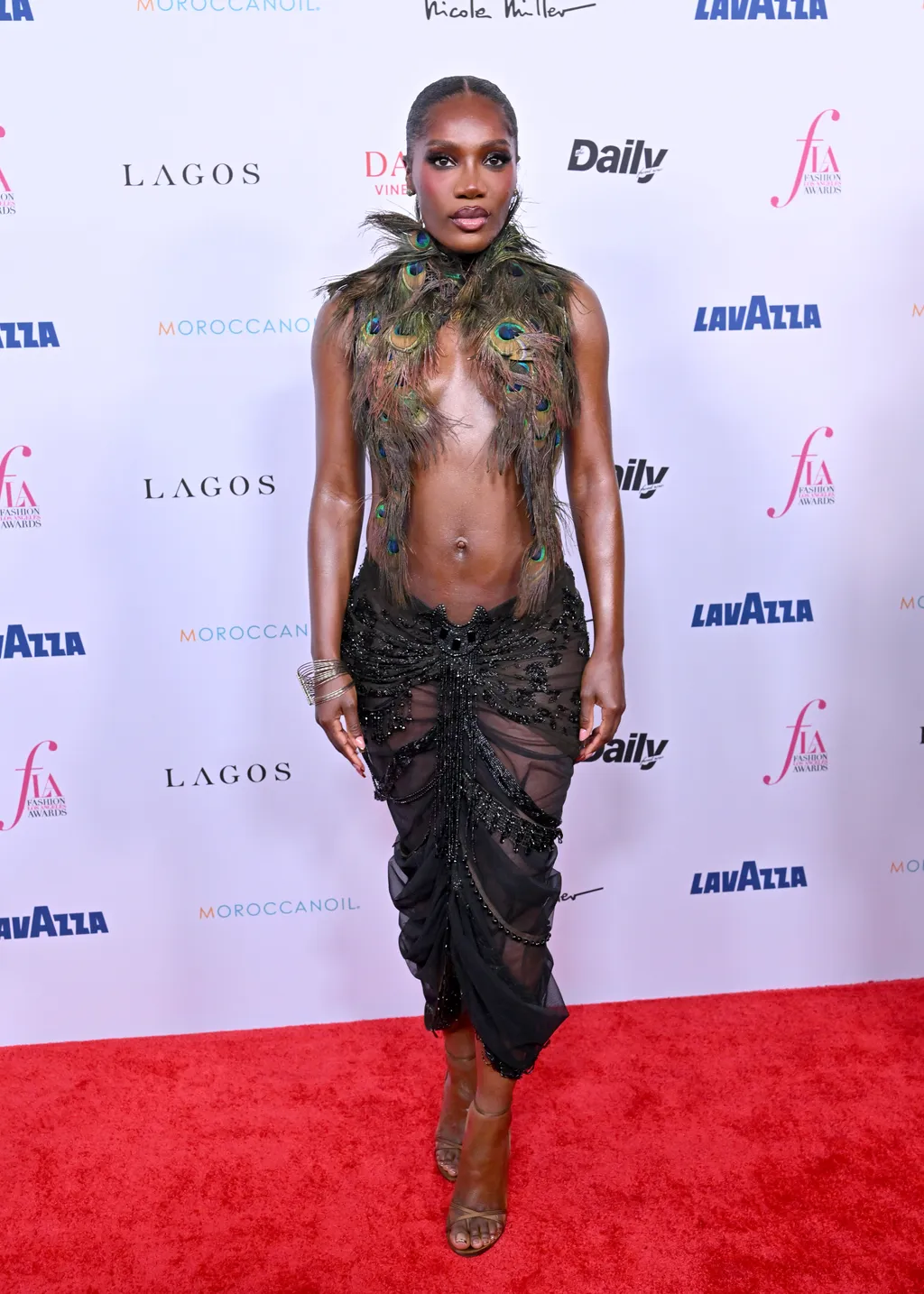 Image may contain Fashion Adult Person and Premiere
