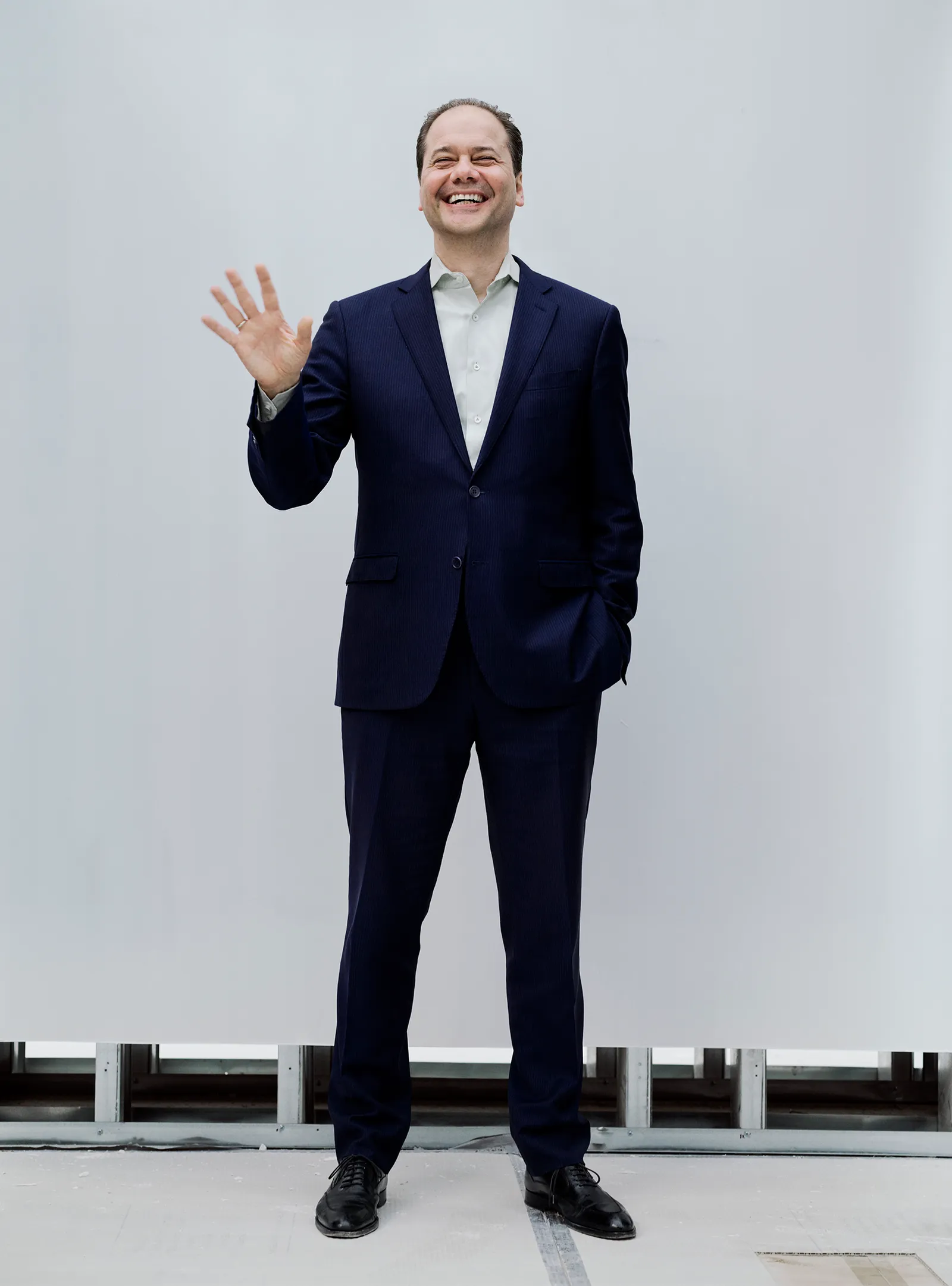 Image may contain Max Hollein Clothing Formal Wear Suit Person Standing Blazer Coat Jacket Adult Head and Face