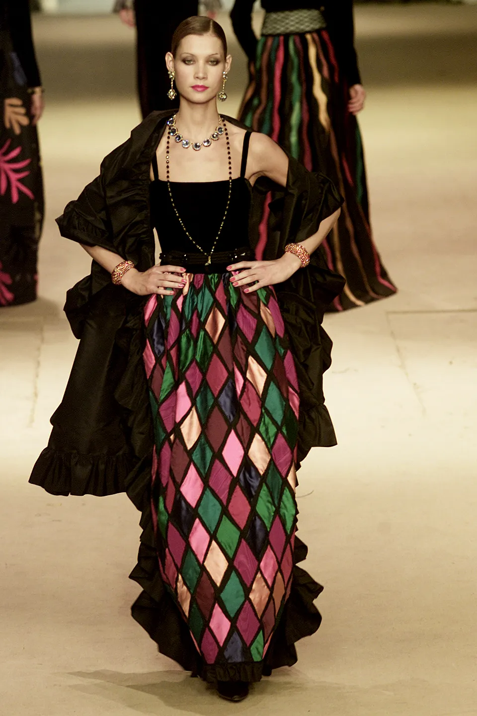 Image may contain Clothing Apparel Human Person Dress Evening Dress Fashion Gown and Robe