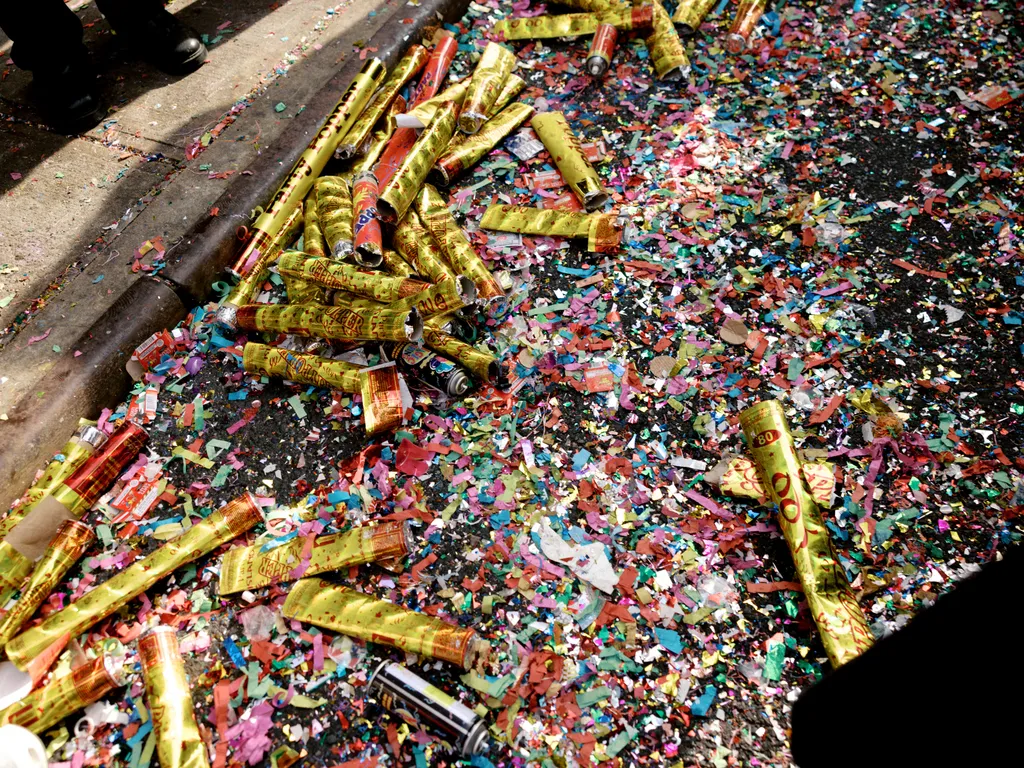 Image may contain Paper Confetti Dynamite and Weapon